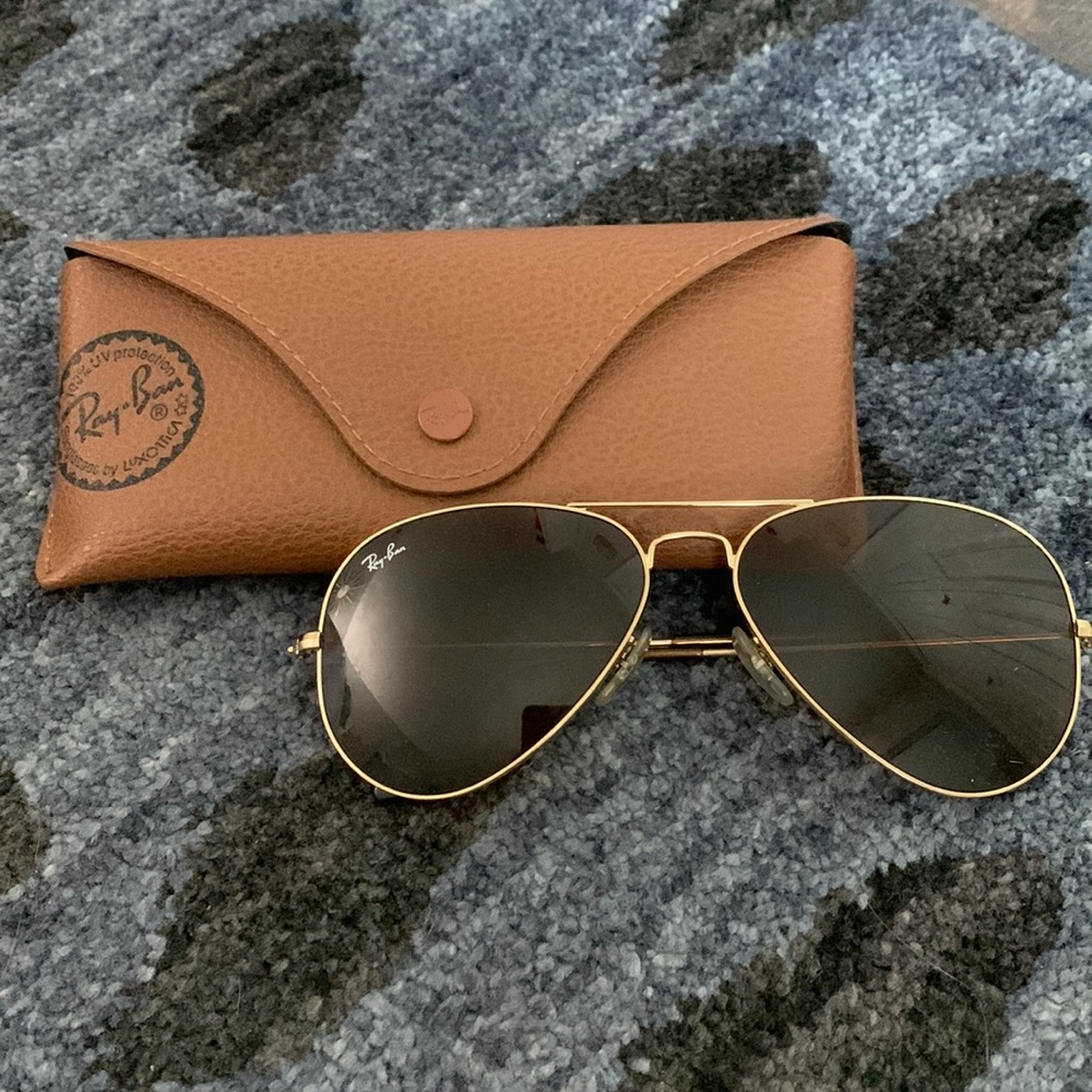 POPULAR Ray-ban aviators with gold lining.